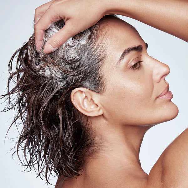 Focusing on the scalp, massage Thickening Shampoo in a circular motion and work through wet hair from root to tips. Allow to sit 1-2 minutes. Rinse thoroughly.
